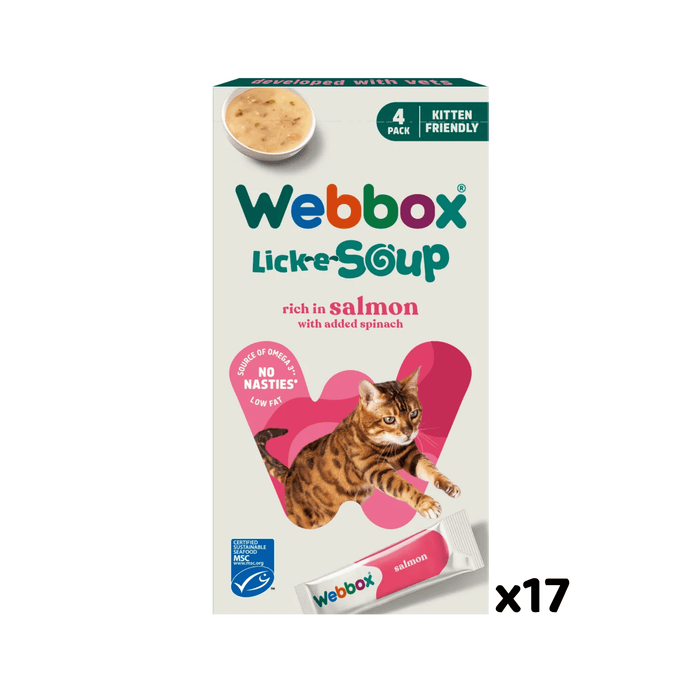 White background with a cream box of Webbox Lick-e-Soup salmon treats for cats, with a tabby cat licking jumping forward on the box.