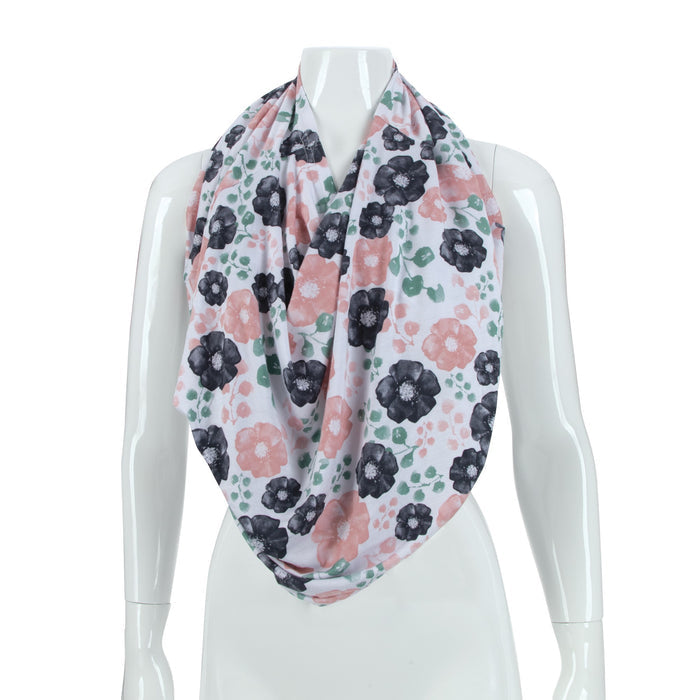 A white mannequin models the 5-in-1 Multipurpose Nursing Cover, a lightweight floral infinity scarf that also serves as an infant car seat cover, nursing cover, and more—making it a baby registry essential.