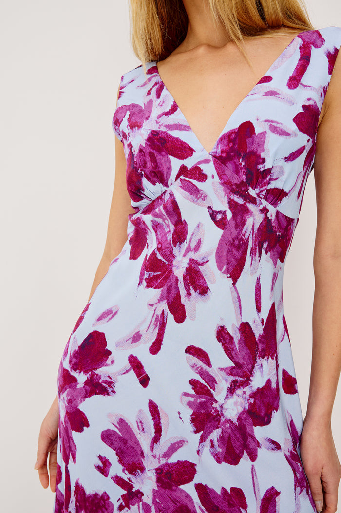 Audrina Sleeveless Midi Dress with Wide Shoulder Straps, a Deep V Neck and V-Back, and an Empire Waist in Blue Lily Colorway - front view on model