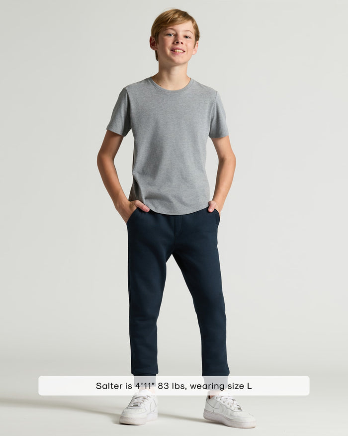 Boy wearing Boys' Heather Gray Classic Curved Hem Crew Neck.