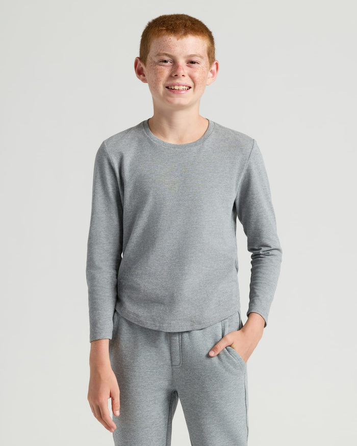 Teen boy wearing Boys' Heather Gray Classic Long Sleeve Crew Neck.