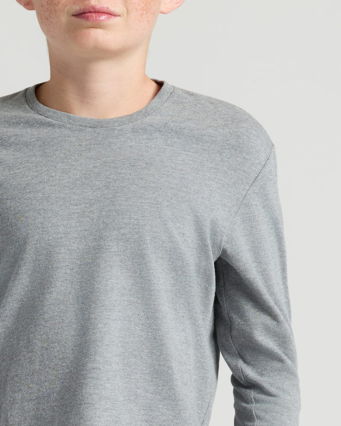 Teen wearing Boys' Heather Gray Classic Long Sleeve Crew Neck.