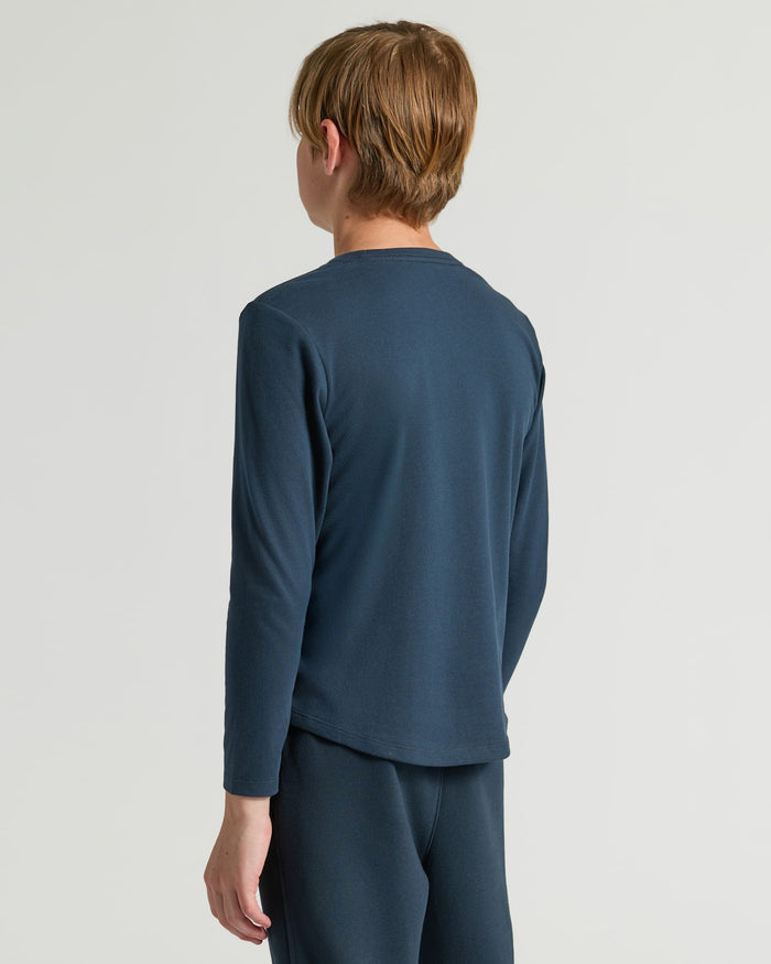 Boys' Navy Classic Long Sleeve Curved Hem Crew from back view.