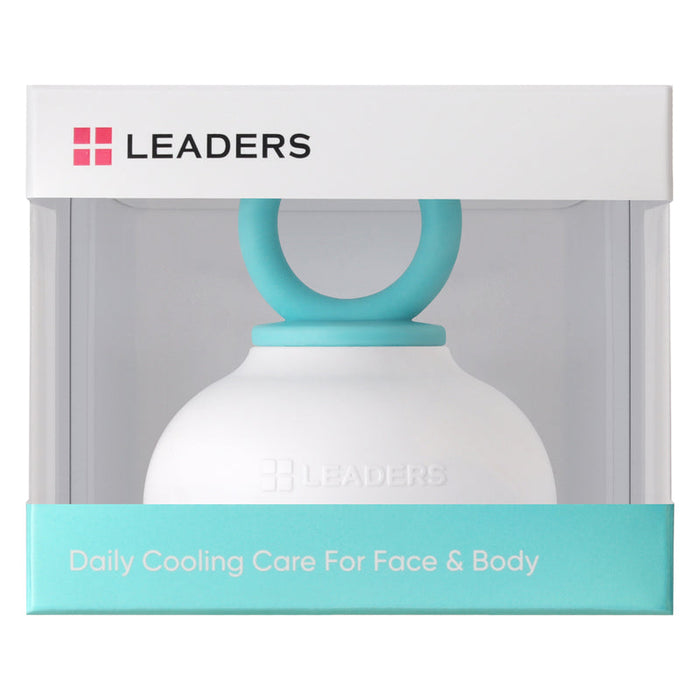 White and turquoise skincare device packaged in a clear box labeled Leaders, designed for daily cooling care for face and body, featuring the product name Calming Face Cooler | Leaders.