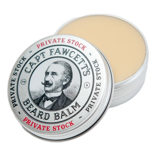 Åpen Captain Fawcett Private Stock skjeggpomade i metallboks med cremefarget balm
