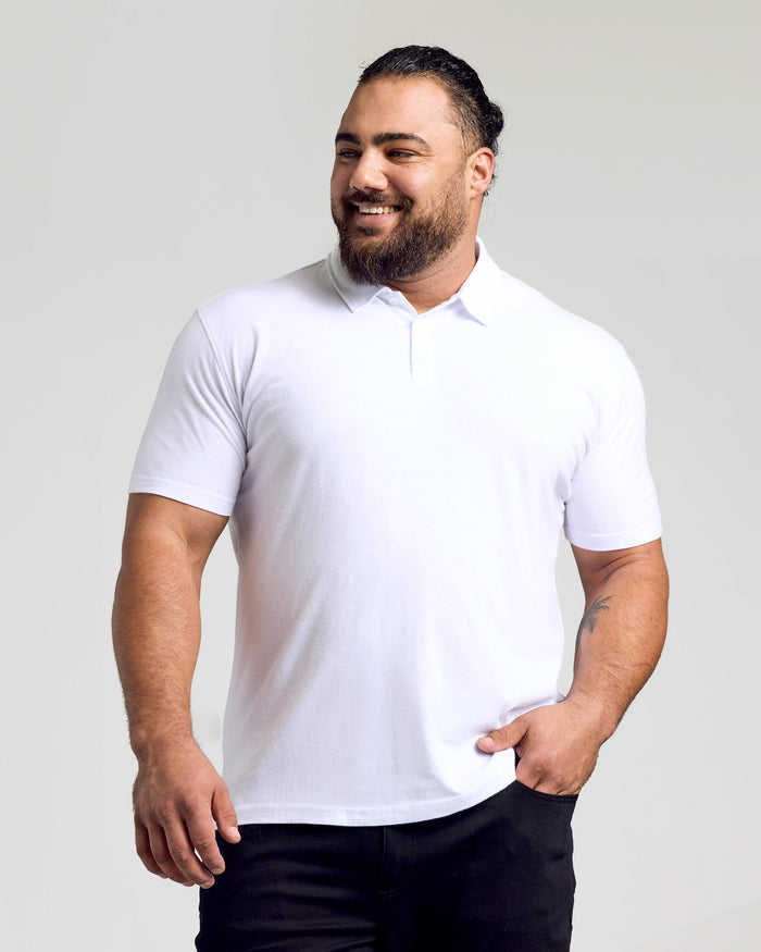 White Classic Polo worn by a bearded man with casual elegance.