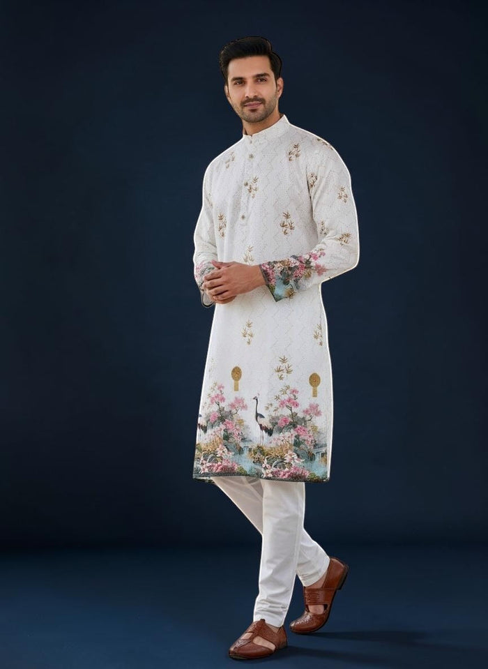 Kurti Connection USA men's white kurta with all-over embroidery and vibrant floral crane print on sleeves and hem.