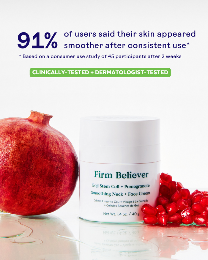 Firm Believer Goji Stem Cell + Pomegranate Smoothing Neck + Face Cream | Three Ships jar placed next to a whole pomegranate and pomegranate seeds with text highlighting 91% of users saw smoother skin after 2 weeks, clinically and dermatologist tested.