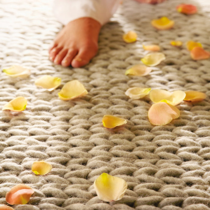 Fusion Oyster Rug made from wool, featuring woven design in solid dark cream.