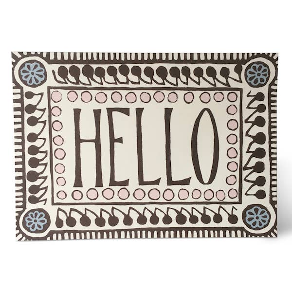 Decorative mat with 'HELLO' text and decorative border on a white background