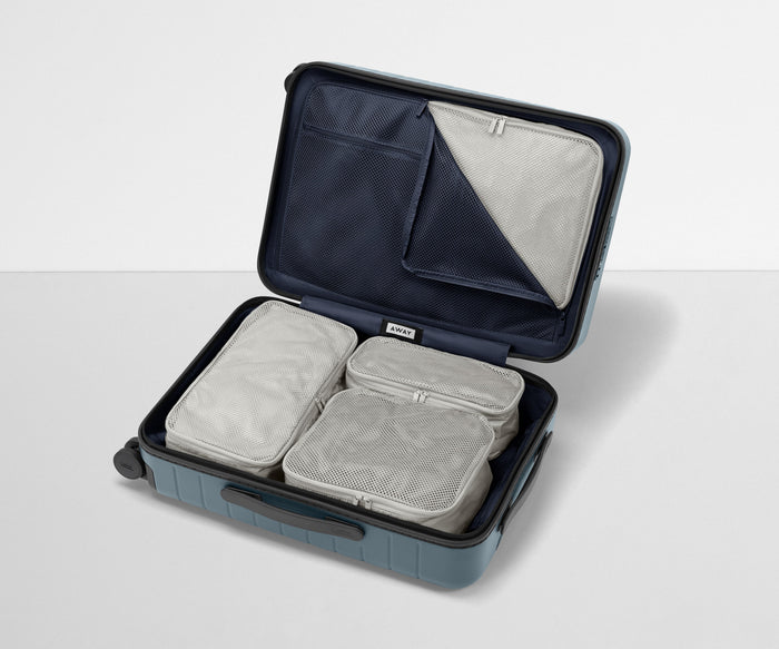 Four Insider Packing Cubes shown inside The Bigger Carry-On
//
Paired with The Bigger Carry-On.
