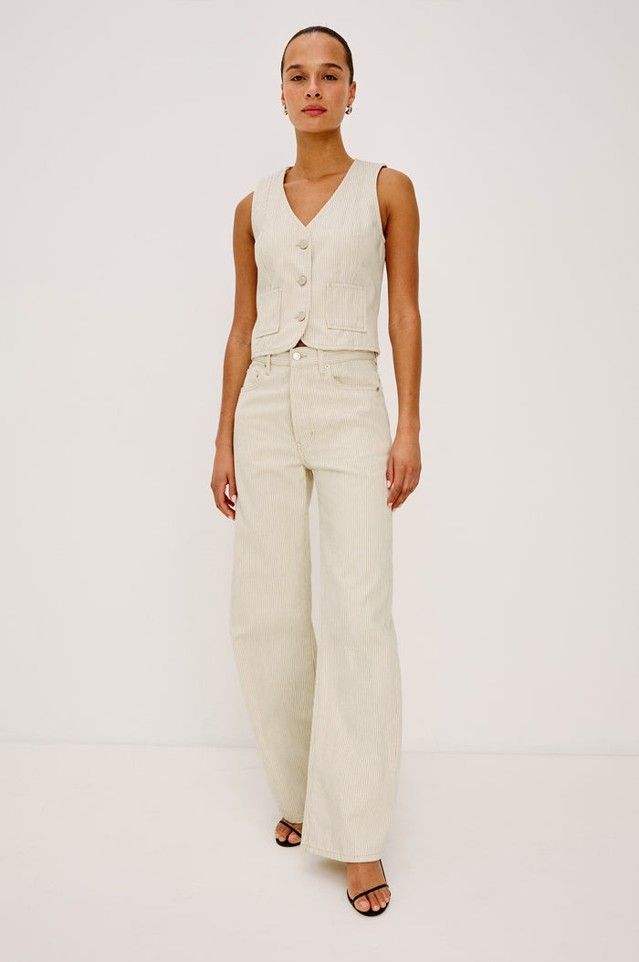 La Jolla Vest With V-Neck, Front Buttons, and Sleeveless Cut in Ecru Railroad Stripe Colorway - Upper Body Front View Featured on Model