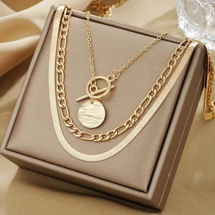 Layered necklace with textured coins Savira | Gold