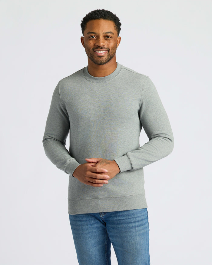 Man wearing Medium Heather Gray Pullover Fleece Crew from 2-Pack.