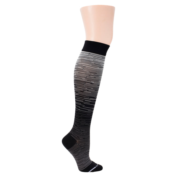 Knee-high compression sock with an ombre design transitioning from light gray to black.