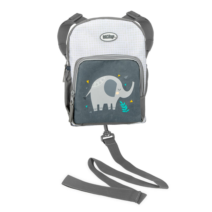 The Nuby Mini Canvas Backpack with Safety Harness is a small gray and white toddler bag with adjustable straps, a cartoon elephant on the front pocket, and a black safety strap at the bottom for extra security.