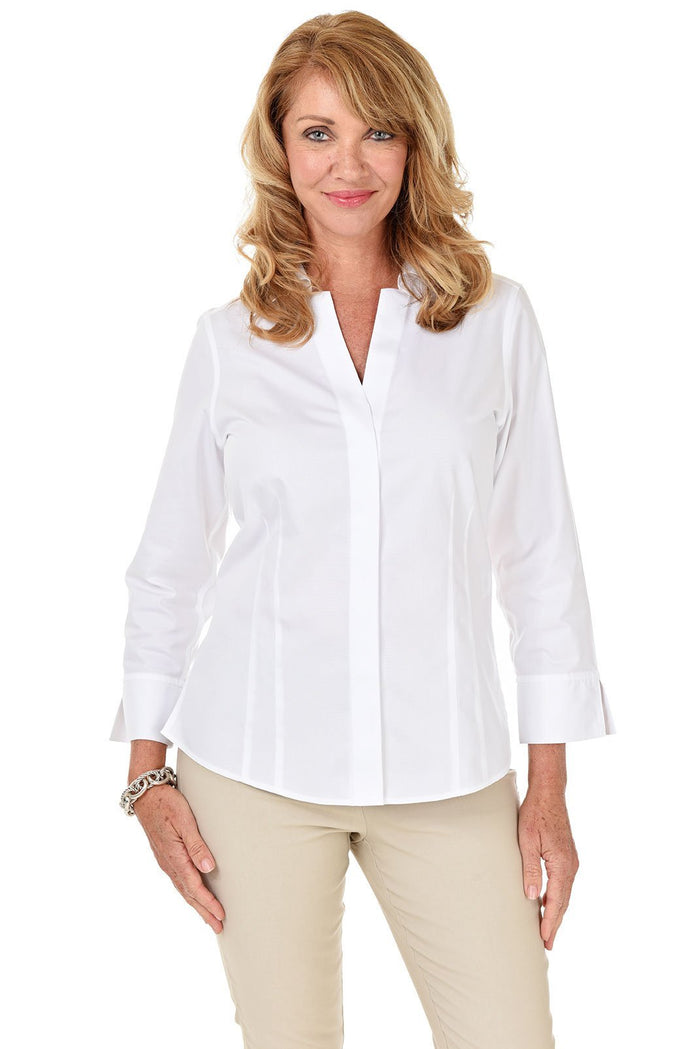 Front photo of a woman in a white classic Foxcroft wrinkle-free non-iron shirt for women, tailored fit with crisp cotton blend.