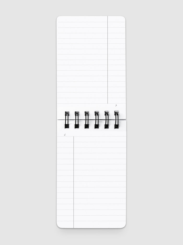Task notepad open on a neutral background.