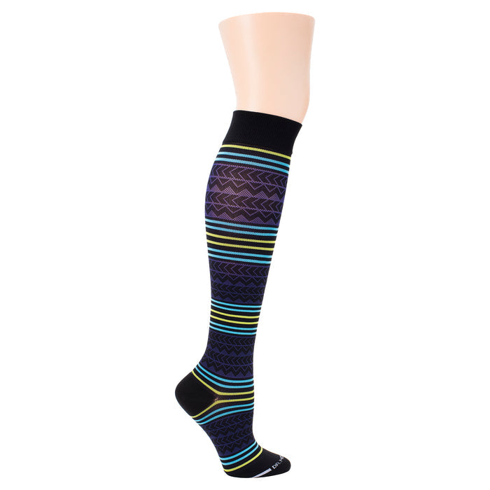 Knee-high compression sock featuring a multicolored Aztec pattern with black and vibrant stripes.