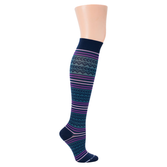 Knee-high compression socks featuring a navy blue base with multicolored Aztec-inspired patterns and stripes.