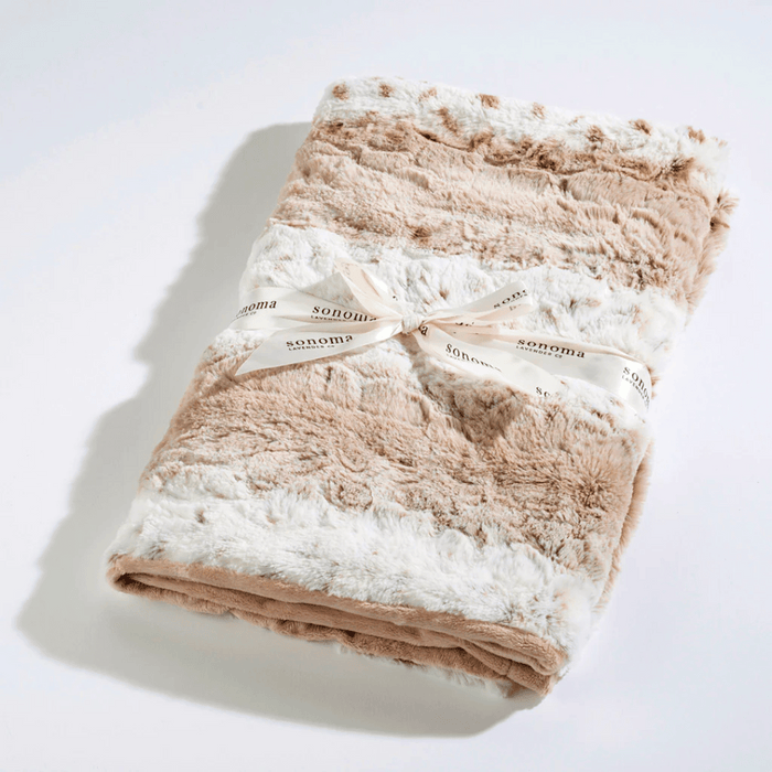 Soft folded Spa Blankie - Arctic Circle Lavender | Sonoma Lavender with a plush, textured surface and tied with a branded ribbon, perfect for wellness and relaxation.