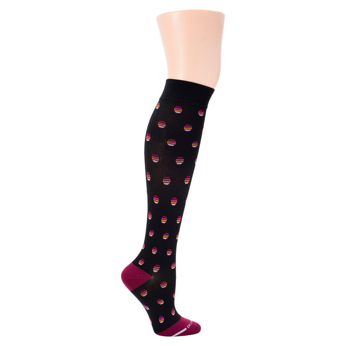 Black compression socks with colorful striped dot patterns, featuring a solid maroon heel and toe.