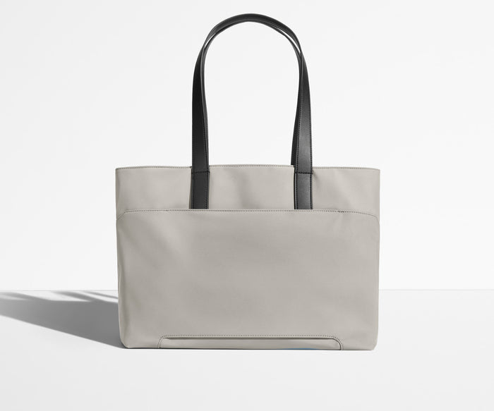 Trolley sleeve on the bag of the Everywhere Tote