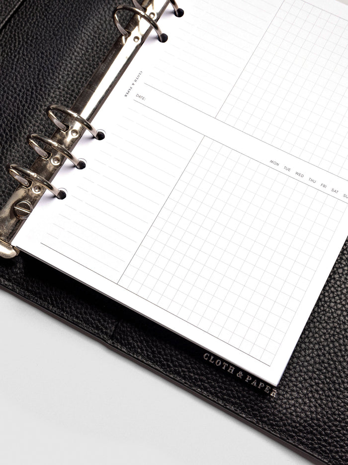 Insert in use inside a black leather planner.