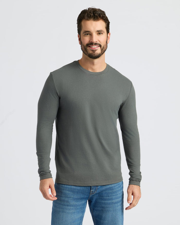 True Classic Men's 4-Pack Long Sleeve Crew Neck T-Shirts worn by a man.