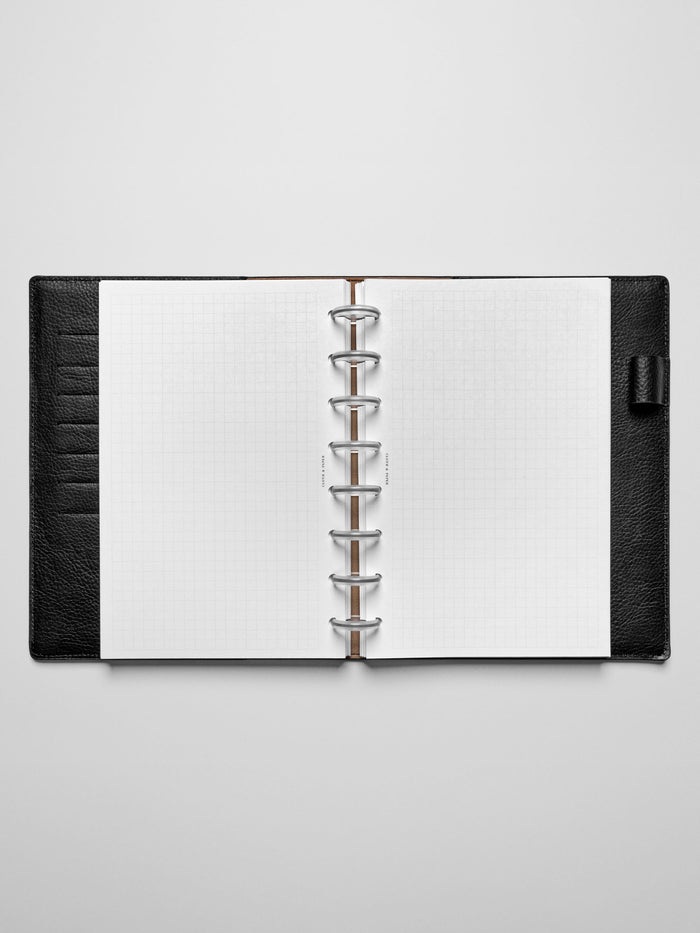 Insert in use inside a black leather planner.