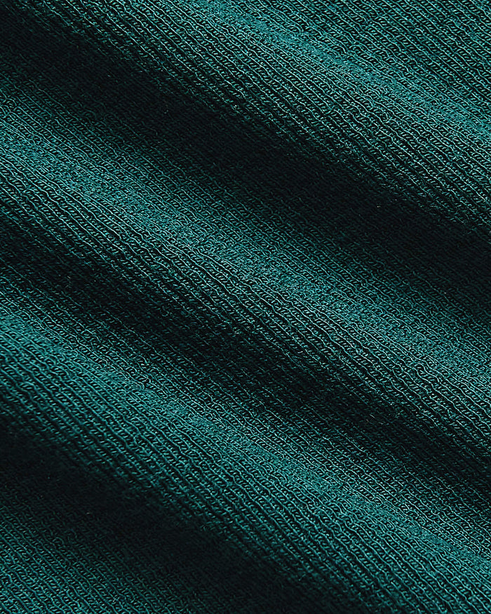 Womens Deep Emerald Ribbed U-Neck Tee fabric close-up, showcasing knit texture.