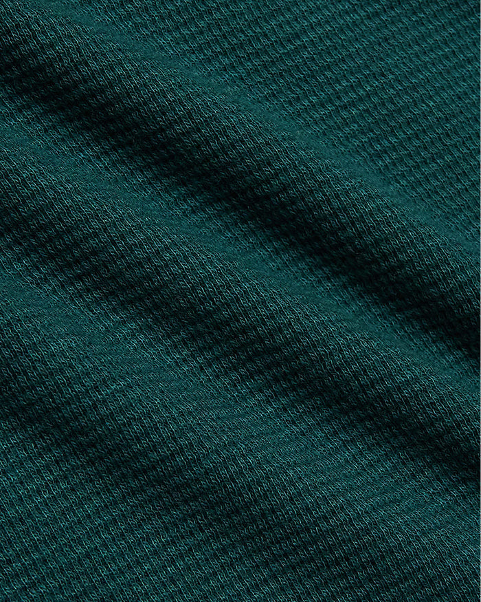 Women's Deep Emerald Waffle Long Sleeve Boxy Henley, showing fine knit texture.