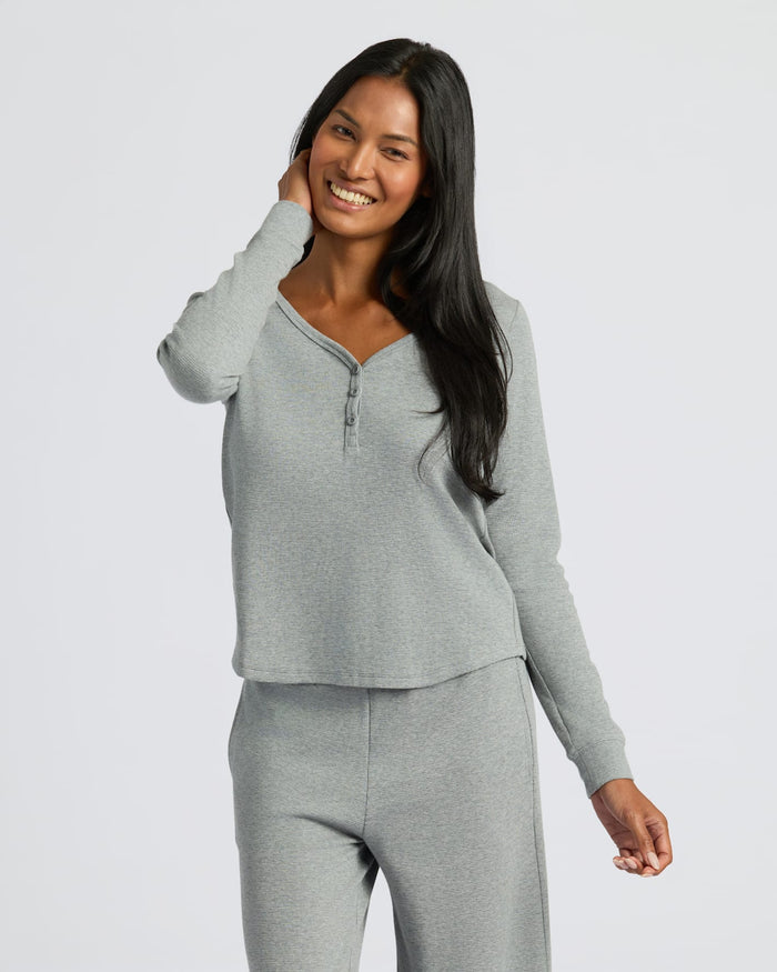 Womens Heather Gray Waffle Long Sleeve Henley & Waffle Leg Pant worn by smiling woman. MODEL_INFO: Candy is 5'9", wearing a size S