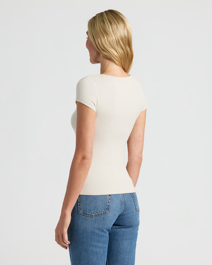 Woman in Womens Ribbed U-Neck Tee 6-Pack, cream top, blue jeans.